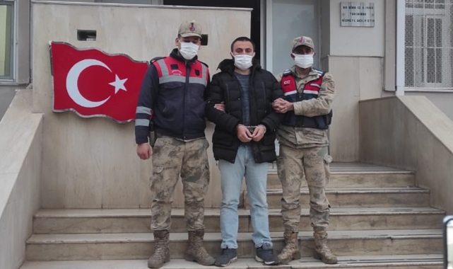 Cinayet zanlısı saman çuvallarının arasında yakalandı