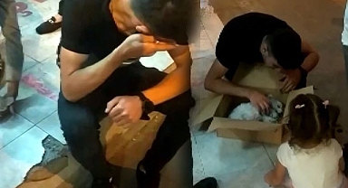 Köpeğin başında dakikalarca ağladı