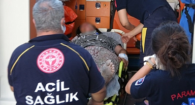 Eşini kafasına taşla vurup yaraladı