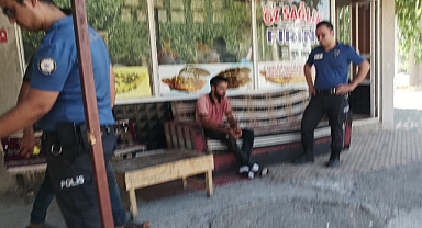 Eşiyle tartışan bir kişi üzerine benzin dökerek kendisini yakmak istedi