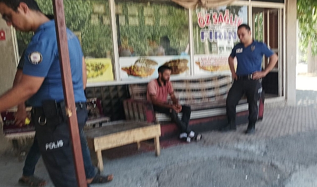 Eşiyle tartışan bir kişi üzerine benzin dökerek kendisini yakmak istedi