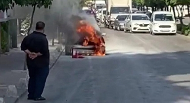 Yanan otomobili film gibi izledi