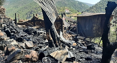 Köydeki yanan eve helikopterli müdahale