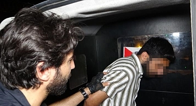 El bombası ve silahla yakalandı