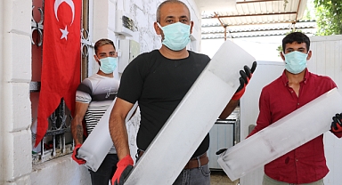 Bunaltan sıcaklarda buzdan para kazanıyorlar