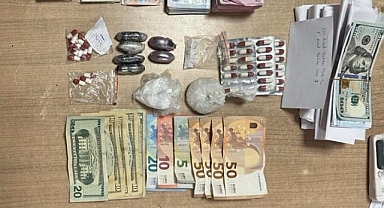 Oyuncak ayıdan para ve uyuşturucu çıktı