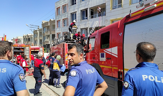 Yangında mahsur kalan anne ve çocuğunu ekipler kurtardı
