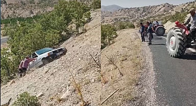 Şarampole uçan otomobil, traktör ile çekilerek çıkarıldı