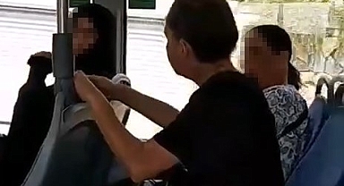Tesettürlü kadına otobüste çirkin saldırı: "Peçeni al git"