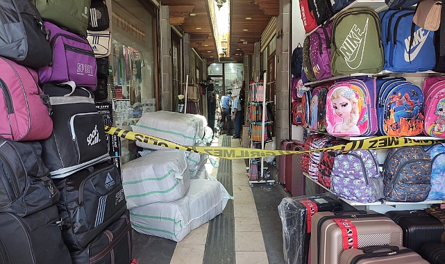 Çarşı göbeğinde esnaf arasında silahlı kavga: 3 yaralı