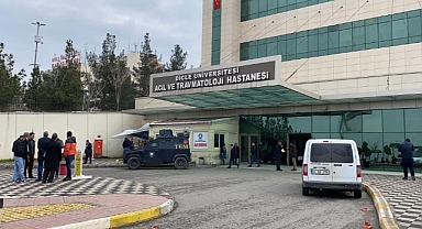 Kavgaya ayırmaya çalışan polis silahla vuruldu