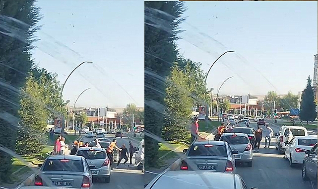 Trafikte tekmeli yumruklu kavga kamerada