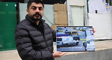 Kargo çalışanları, müşterinin iş yerini basarak camı çerçeveyi indirdi