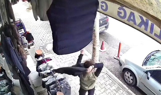 Şanlıurfa'da deniyormuş gibi yaptığı yelekleri çaldı, kameraya yakalandı